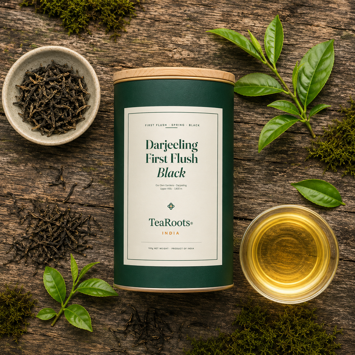 Overhead flat lay of the Darjeeling First Flush Black tin with dry leaf and brewed cup